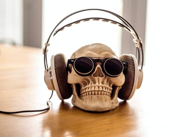 skeleton wearing headphones