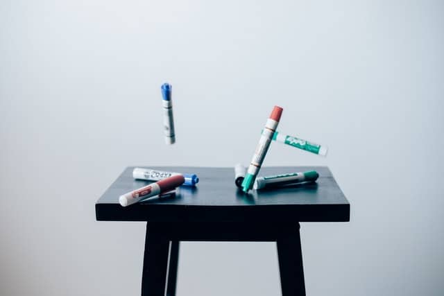 markers on a table