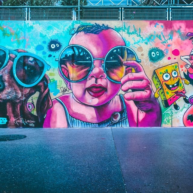 spray paint baby with glasses