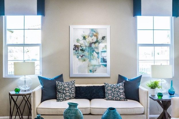 hanging a canvas painting